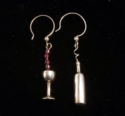 Sterling silver wine bottle and wine glass with garnet beads on silver wire dangles.