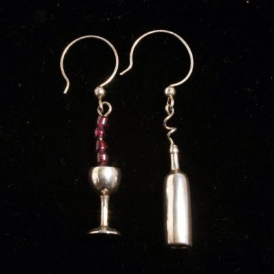 Sterling silver wine bottle and wine glass with garnet beads on silver wire dangles.